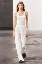 WHITE FLOWING TROUSERS WITH SIDE ZIP